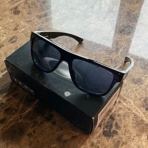 Oakley Breadbox Polished black with grey. NEVER WORN! Comes with box
